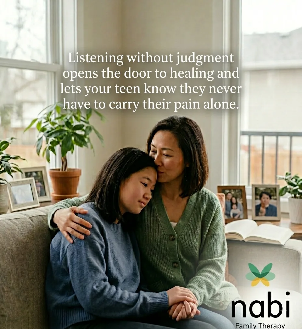 A mother rests her head against her teenage daughter on a couch, with text reading "Listening without judgment opens the door to healing and lets your teen know they never have to carry their pain alone," and the Nabi Family Therapy logo.