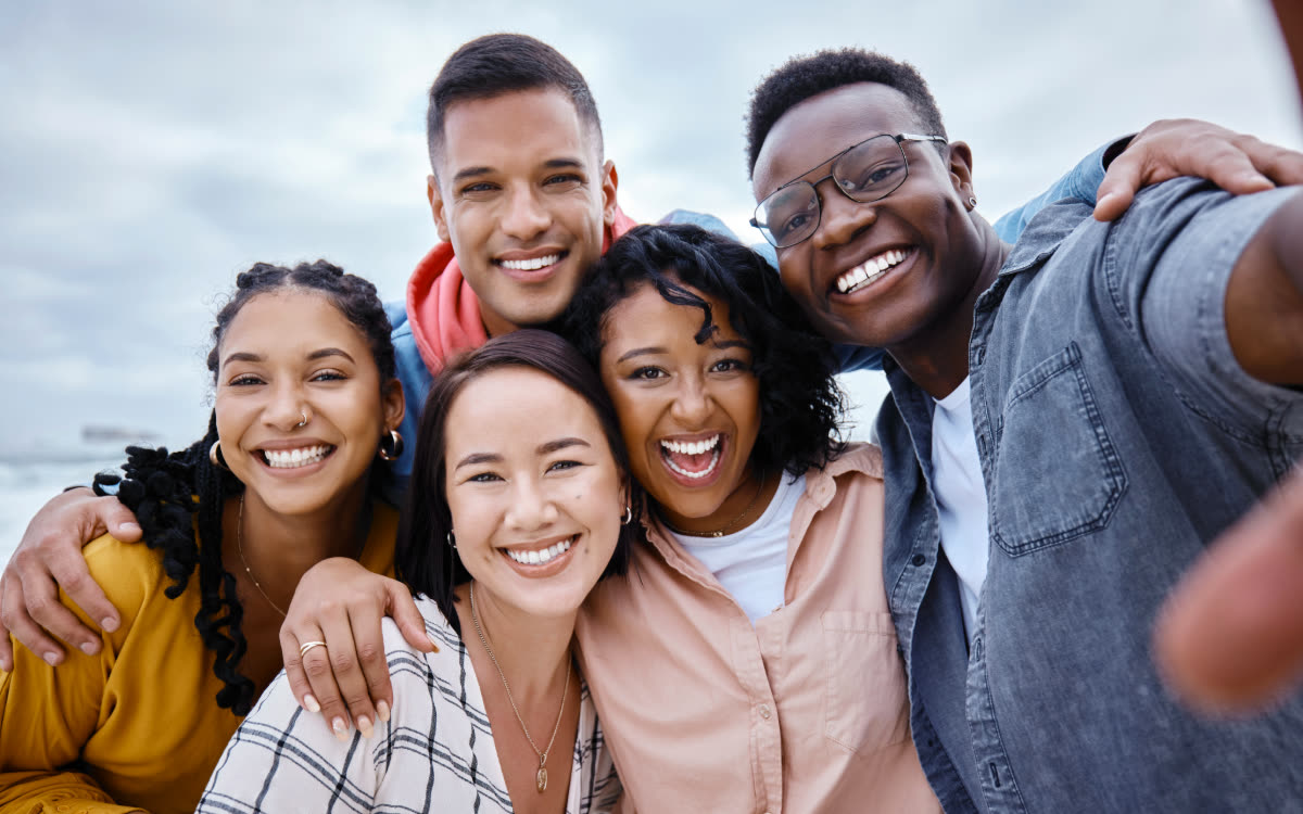 A small group of adults gathered in a supportive circle.